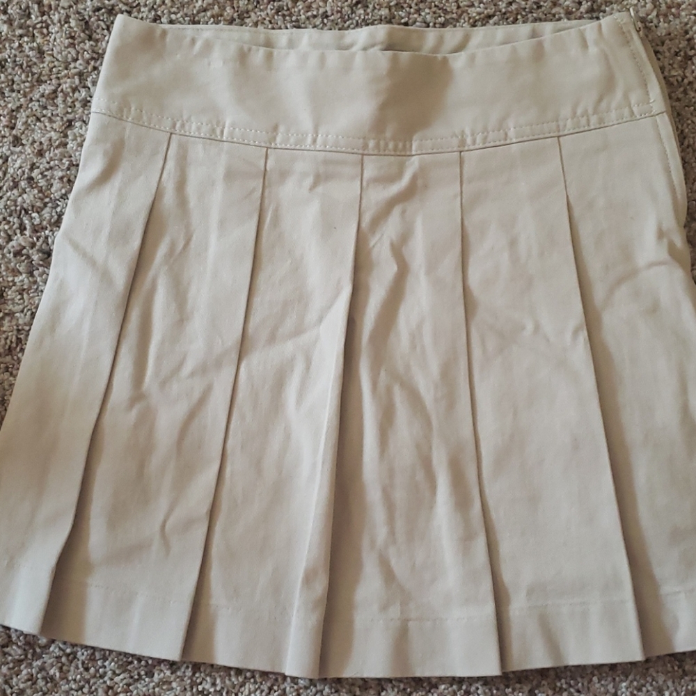 Girls pleated tan skirt with under shorts